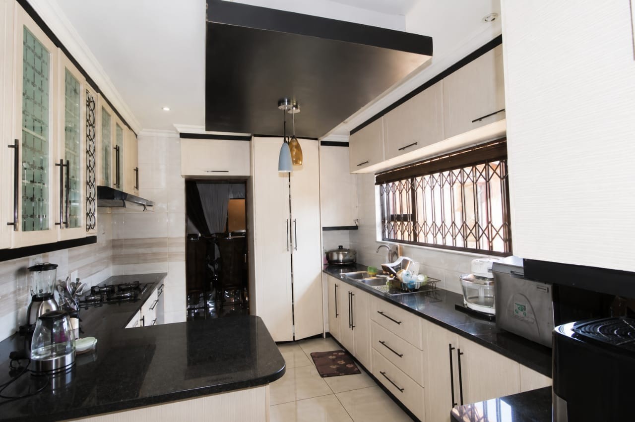Charming 9-Bedroom Investment Home in a Prime Location!