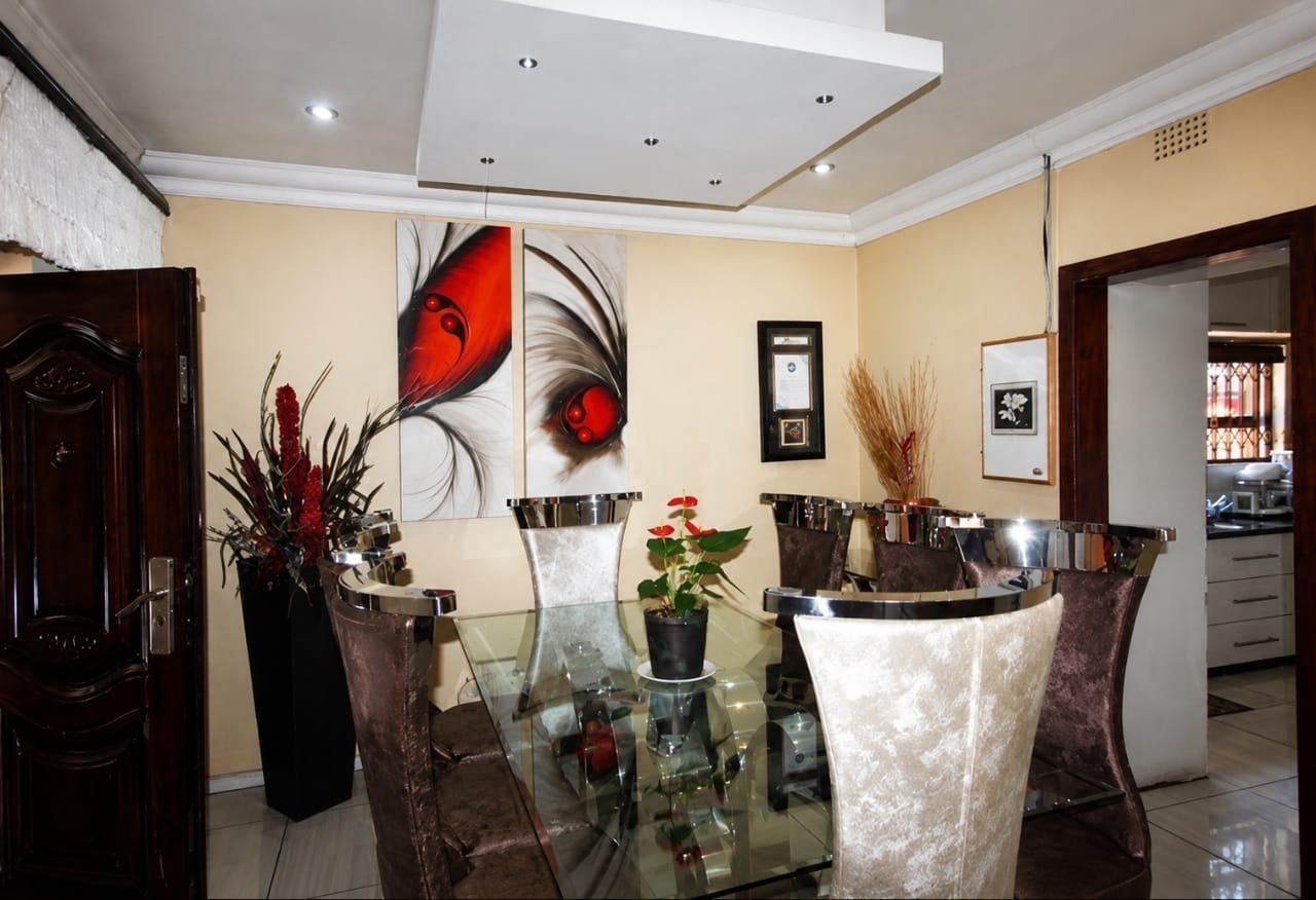 Charming 9-Bedroom Investment Home in a Prime Location!