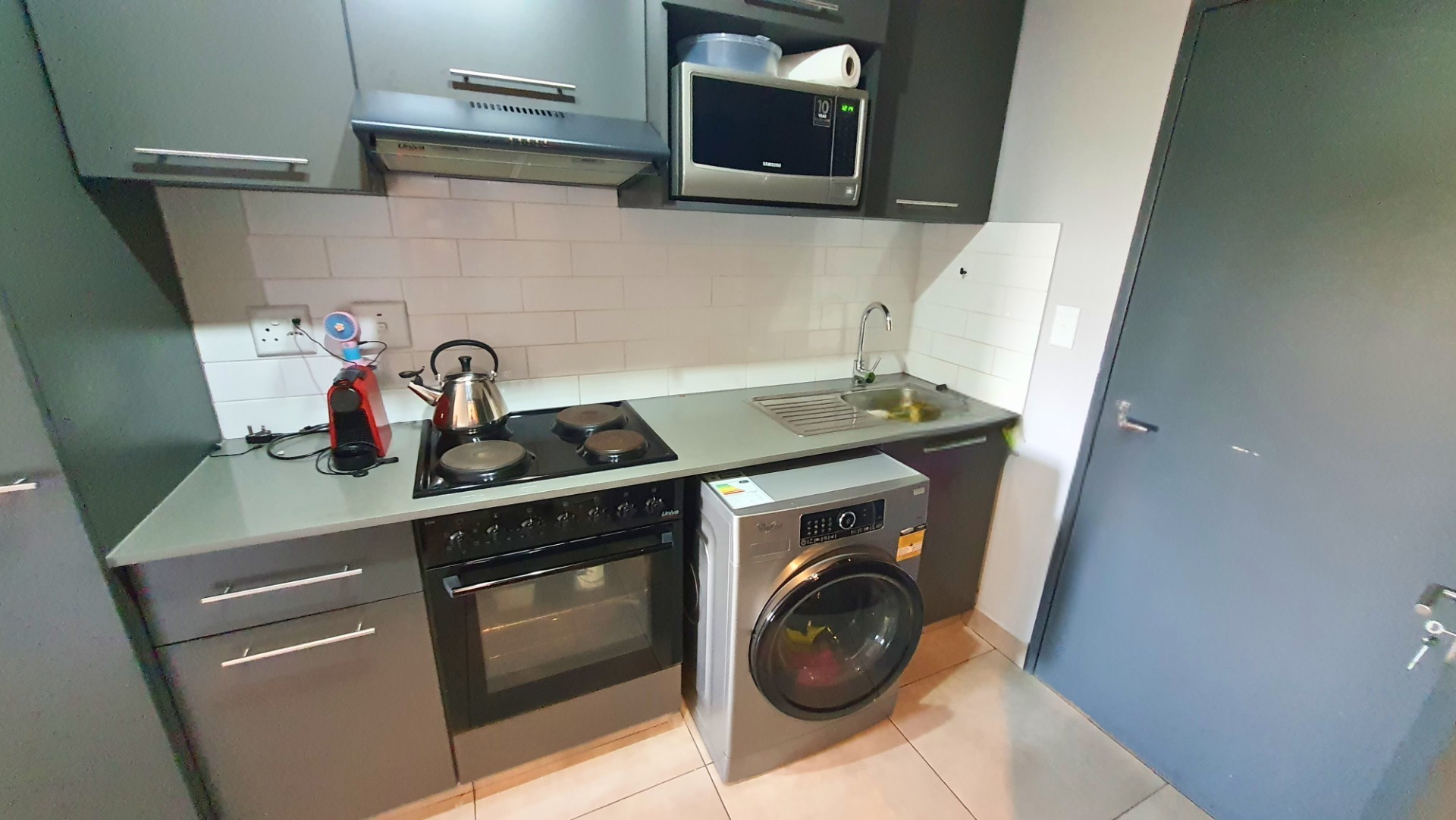 Modern Apartment with Patio in Sought After Complex