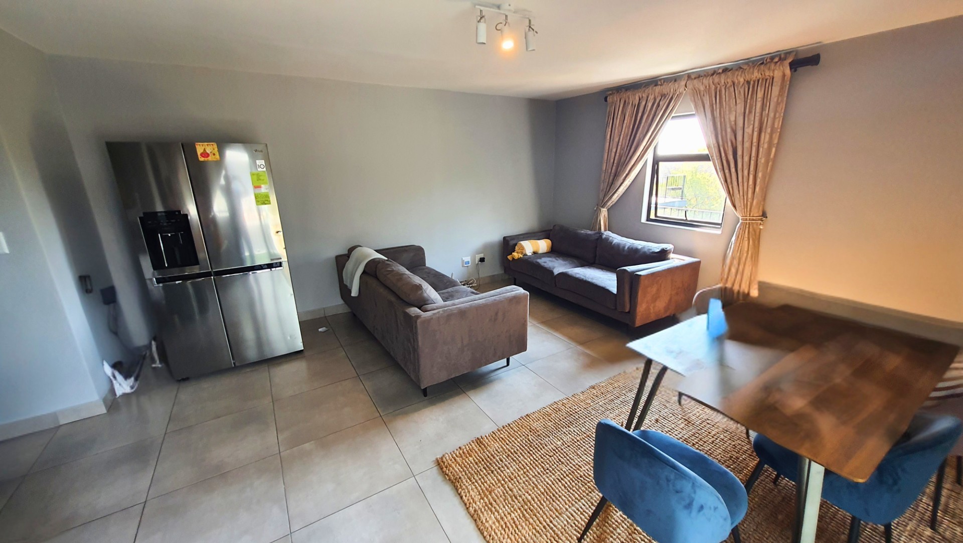 Modern Apartment with Patio in Sought After Complex