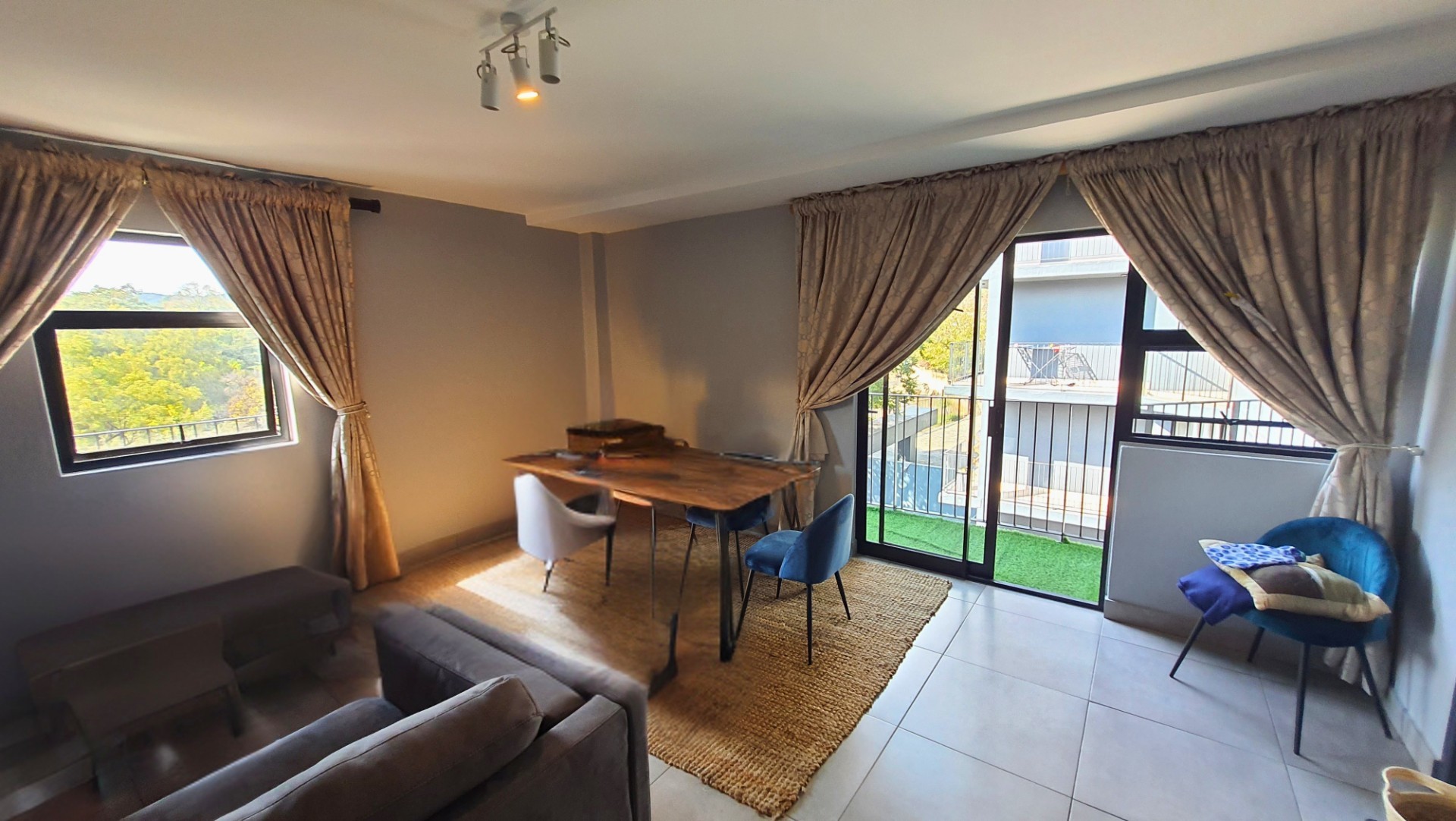 Modern Apartment with Patio in Sought After Complex