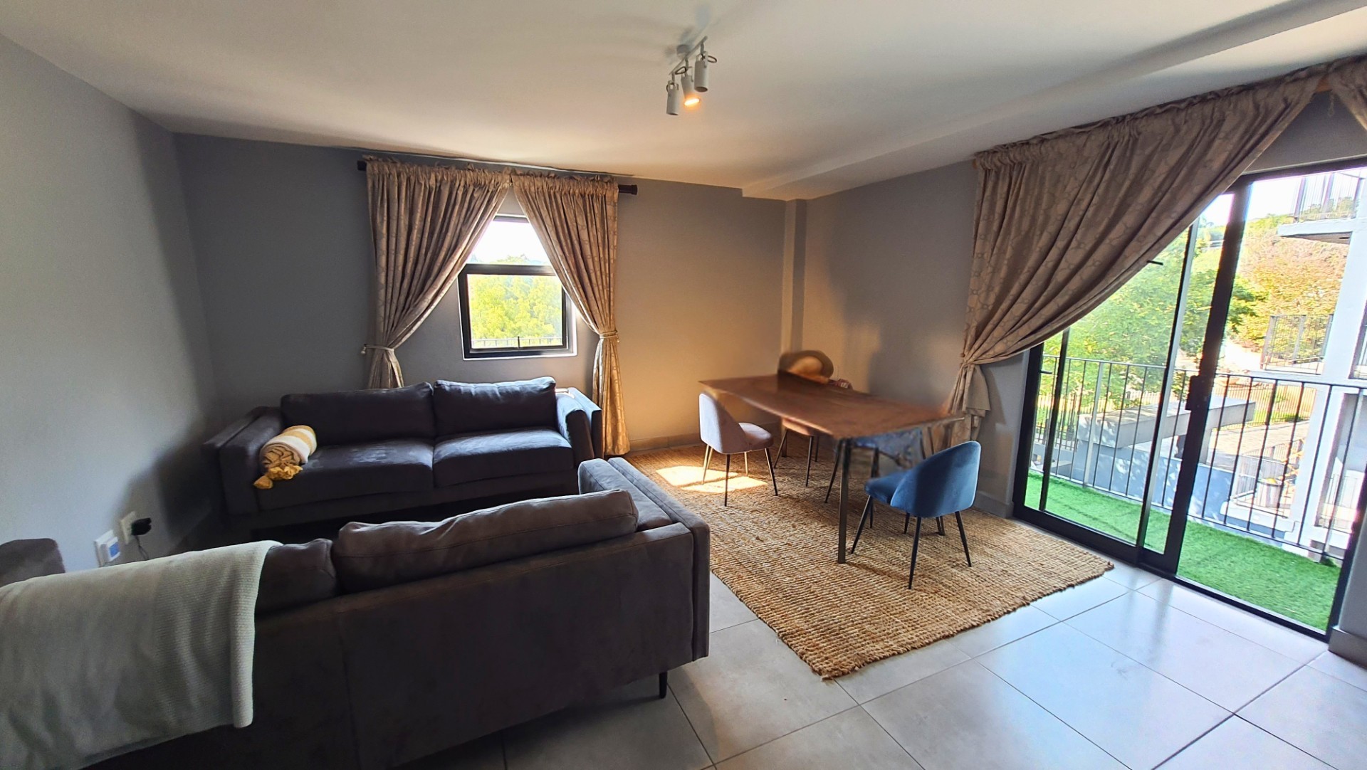 Modern Apartment with Patio in Sought After Complex