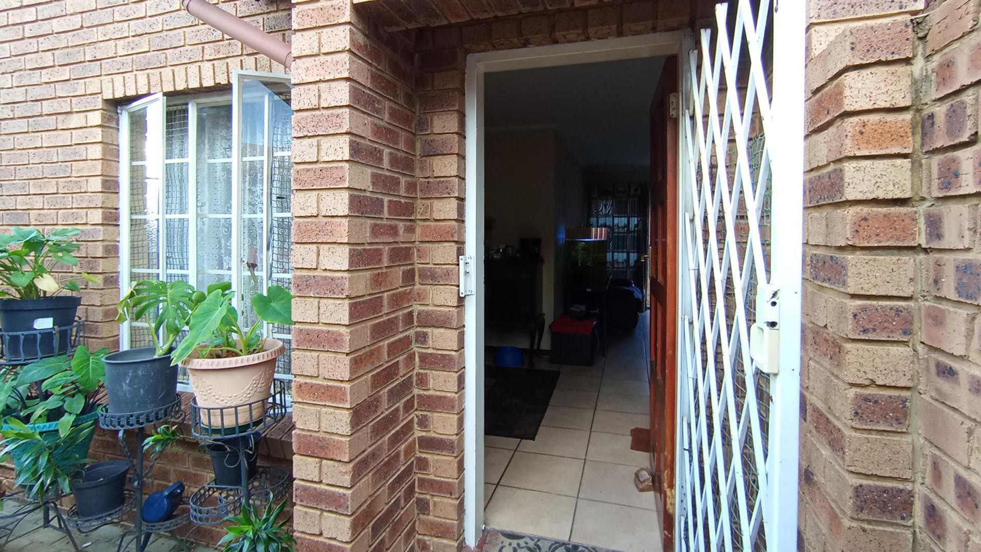 Charming 2-Bed, 1 Bath Duplex for sale in a secure and Family- friendly Community