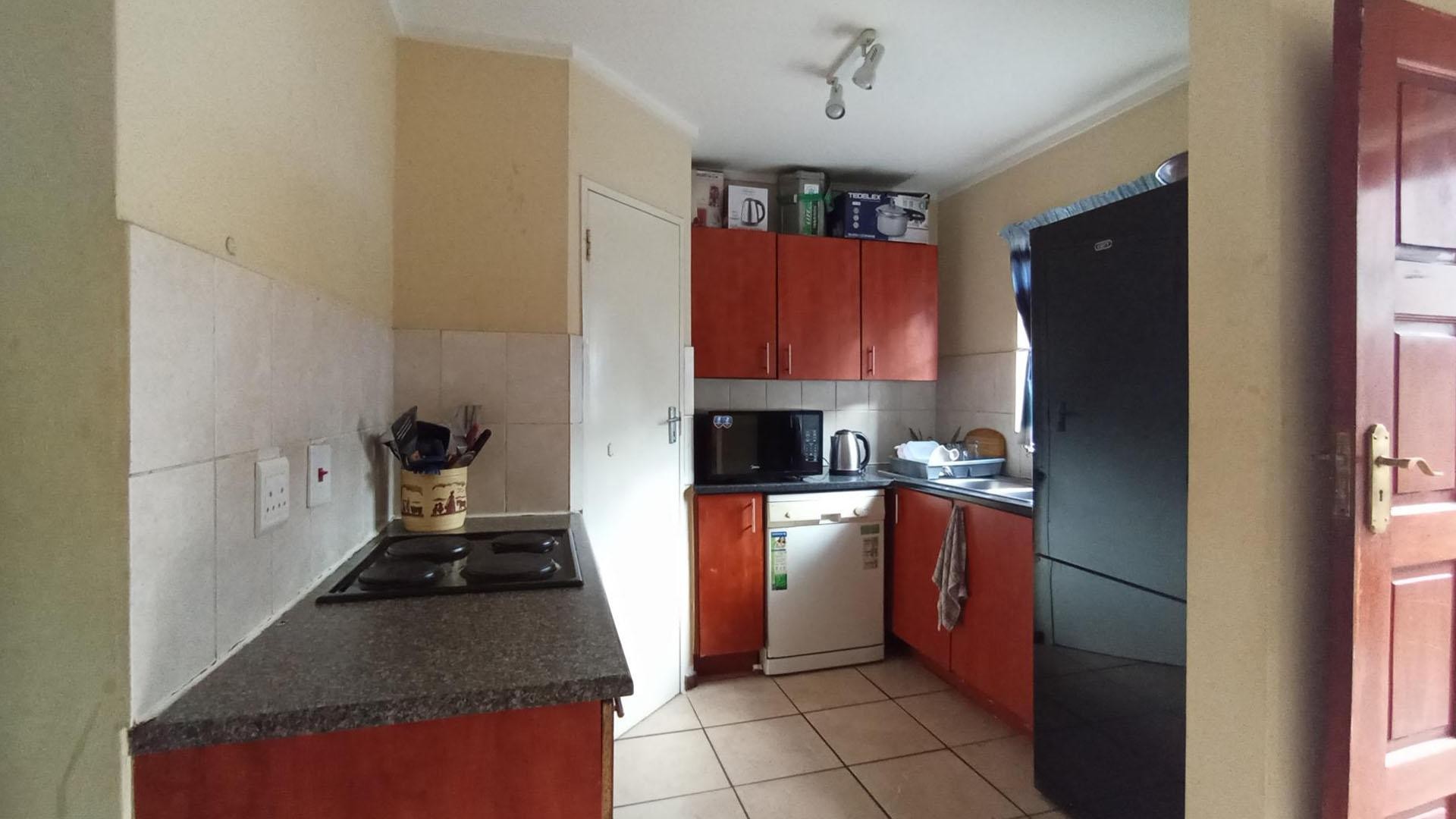 Charming 2-Bed, 1 Bath Duplex for sale in a secure and Family- friendly Community