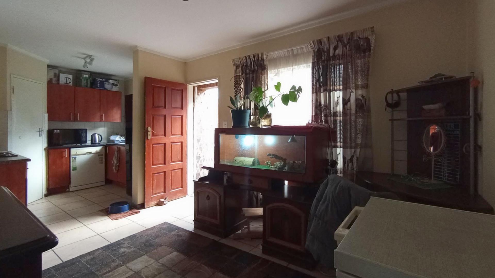 Charming 2-Bed, 1 Bath Duplex for sale in a secure and Family- friendly Community