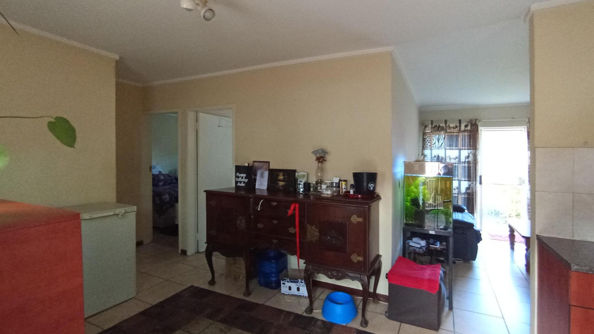Charming 2-Bed, 1 Bath Duplex for sale in a secure and Family- friendly Community