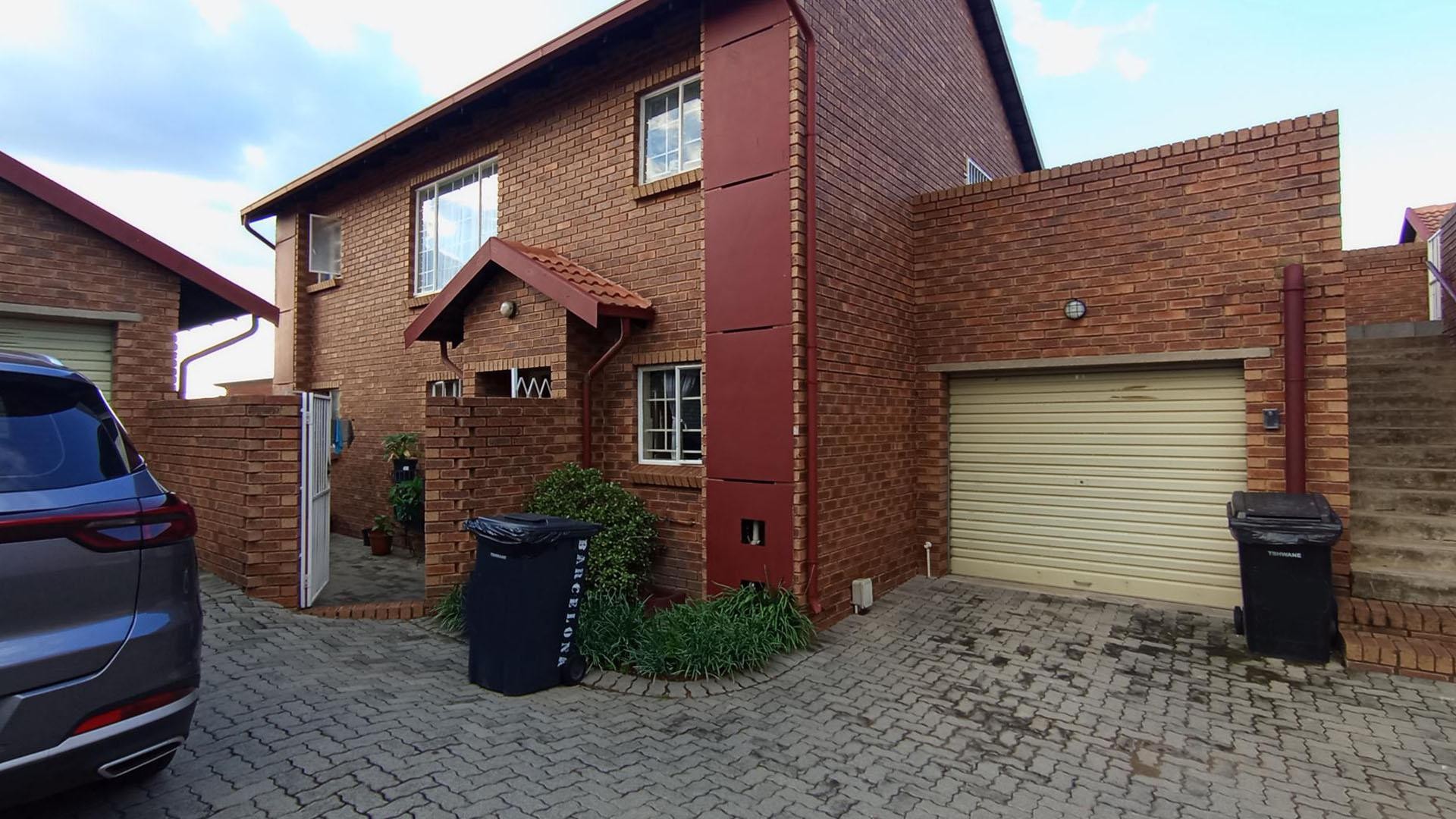 Charming 2-Bed, 1 Bath Duplex for sale in a secure and Family- friendly Community