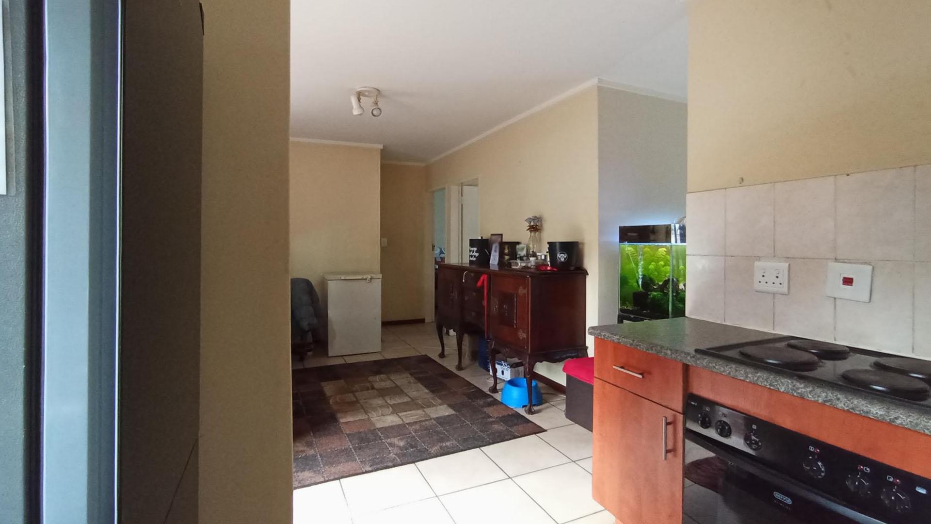Charming 2-Bed, 1 Bath Duplex for sale in a secure and Family- friendly Community