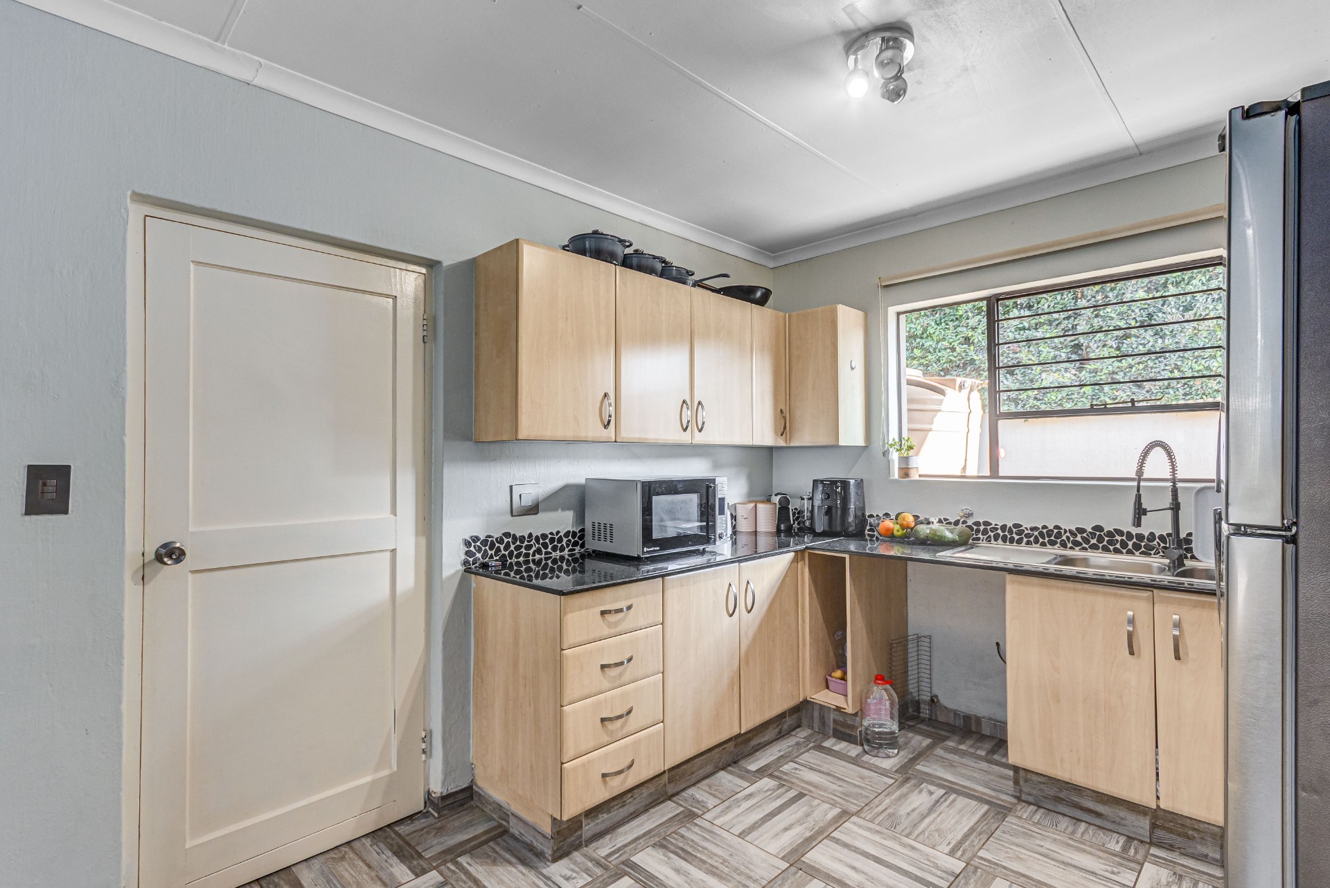 Beautifully Renovated 3 Bedroom Simplex with Wrap-Around Garden in Prime Broadacres Estate