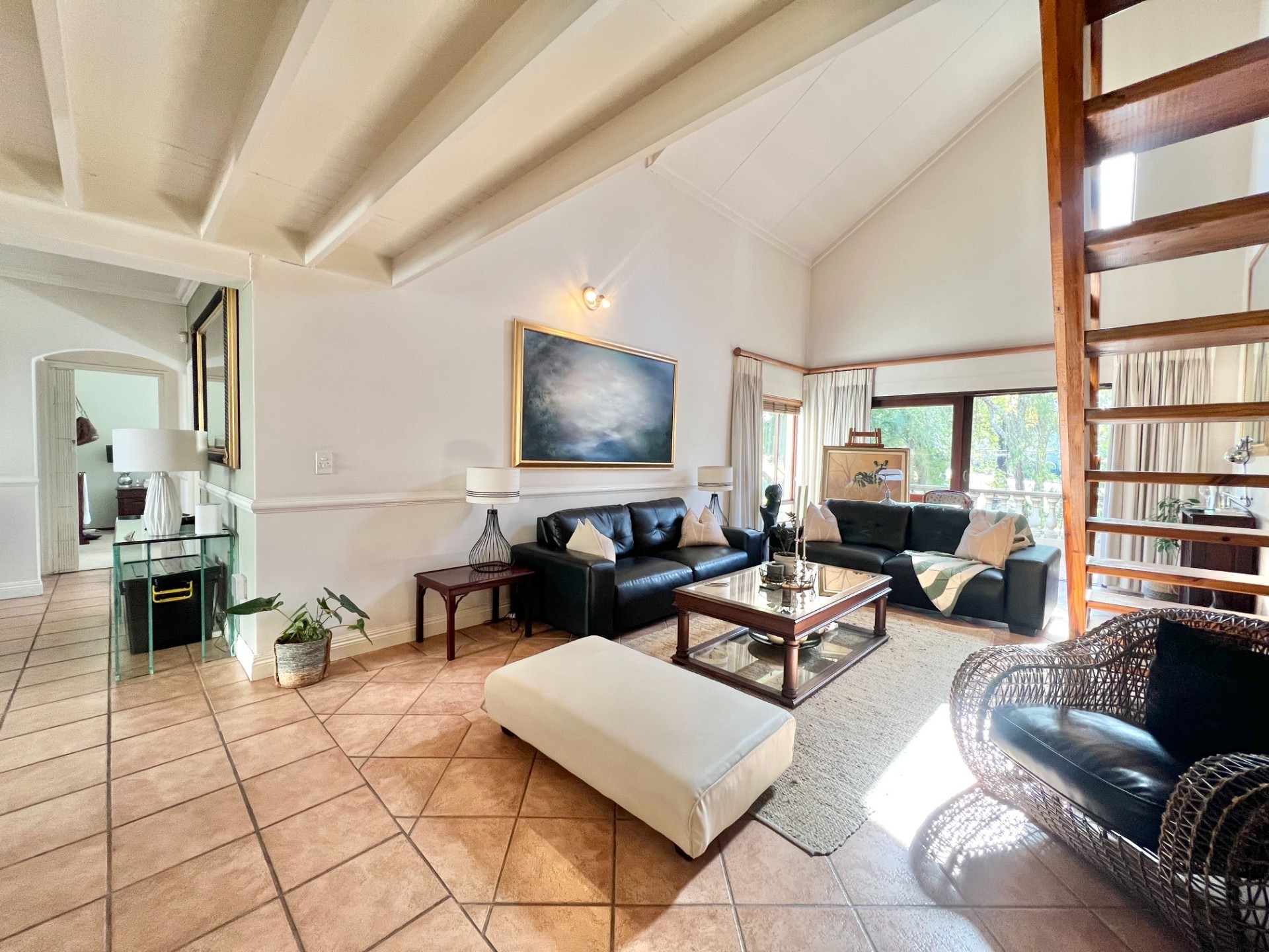 Fully Furnished 2-Bedroom Loft Apartment with Expansive Living Areas and Park Views