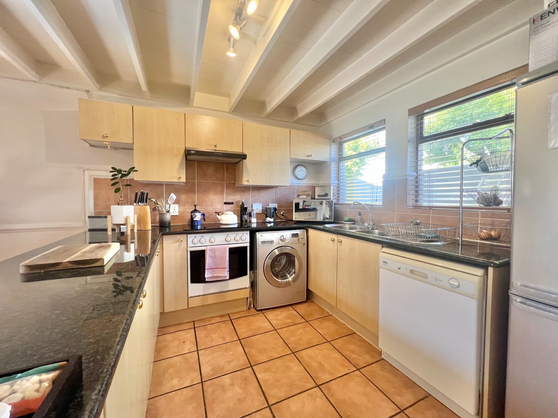 Fully Furnished 2-Bedroom Loft Apartment with Expansive Living Areas and Park Views