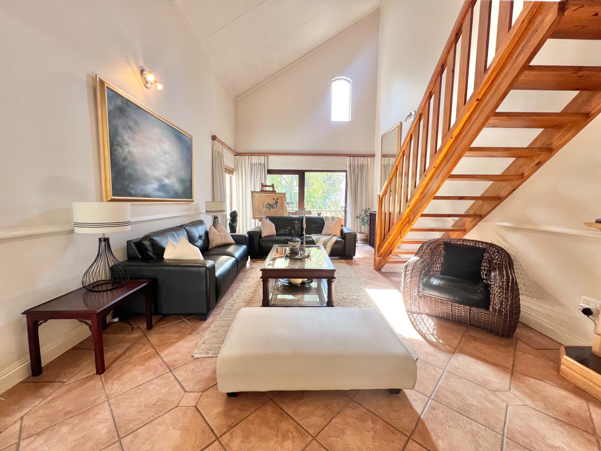 Fully Furnished 2-Bedroom Loft Apartment with Expansive Living Areas and Park Views