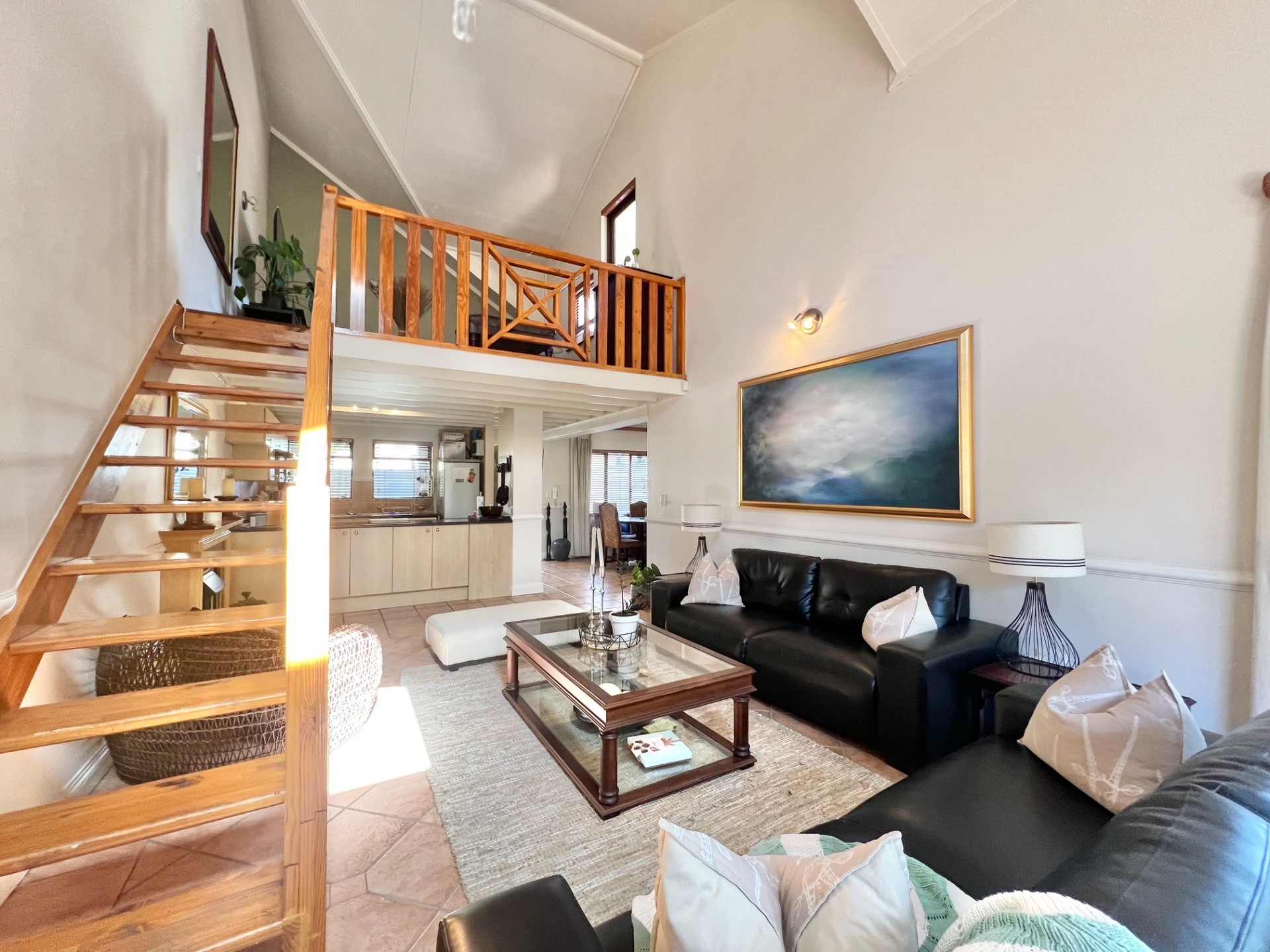 Fully Furnished 2-Bedroom Loft Apartment with Expansive Living Areas and Park Views