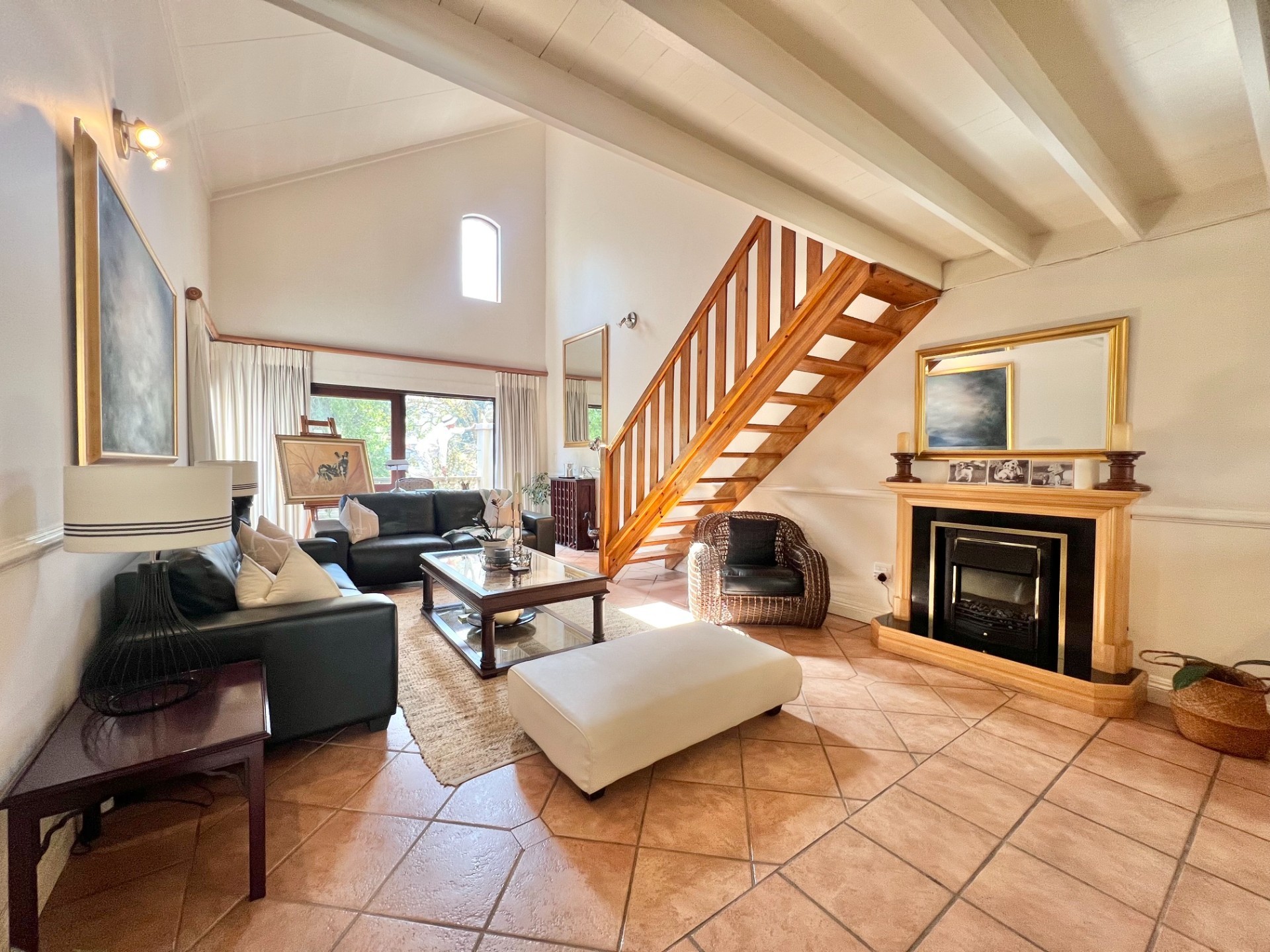 Fully Furnished 2-Bedroom Loft Apartment with Expansive Living Areas and Park Views
