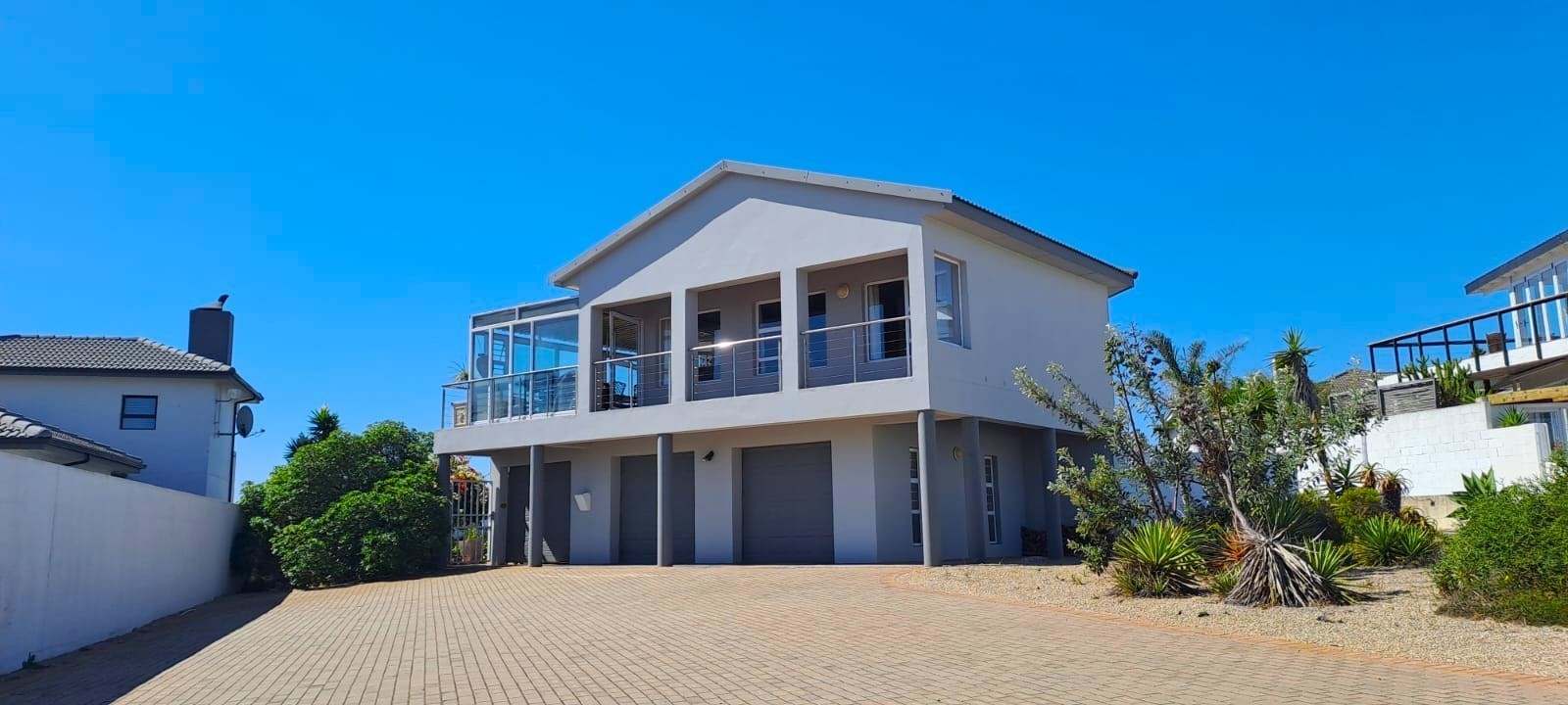 Spectacular Home with Lagoon Views, Golf Course Frontage and Exceptional Entertainment Spaces