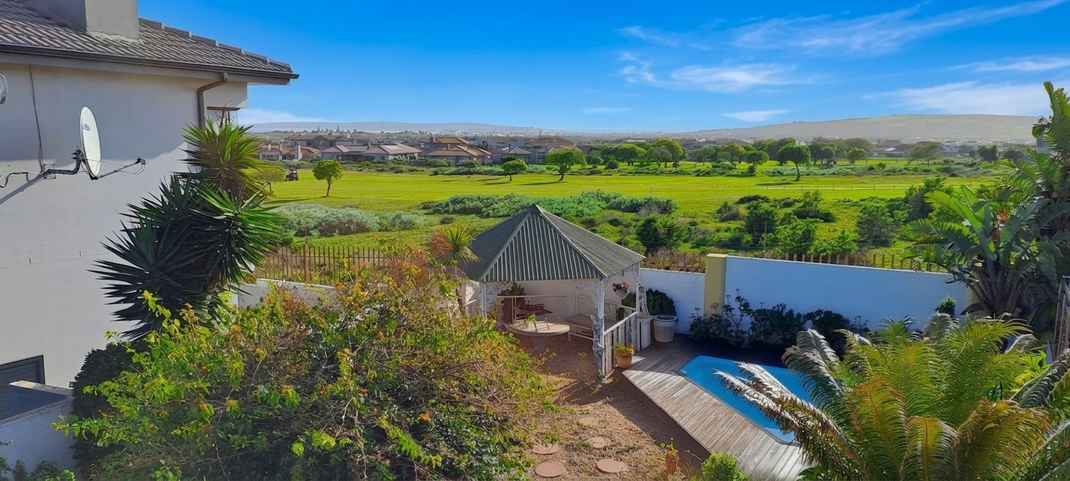 Spectacular Home with Lagoon Views, Golf Course Frontage and Exceptional Entertainment Spaces
