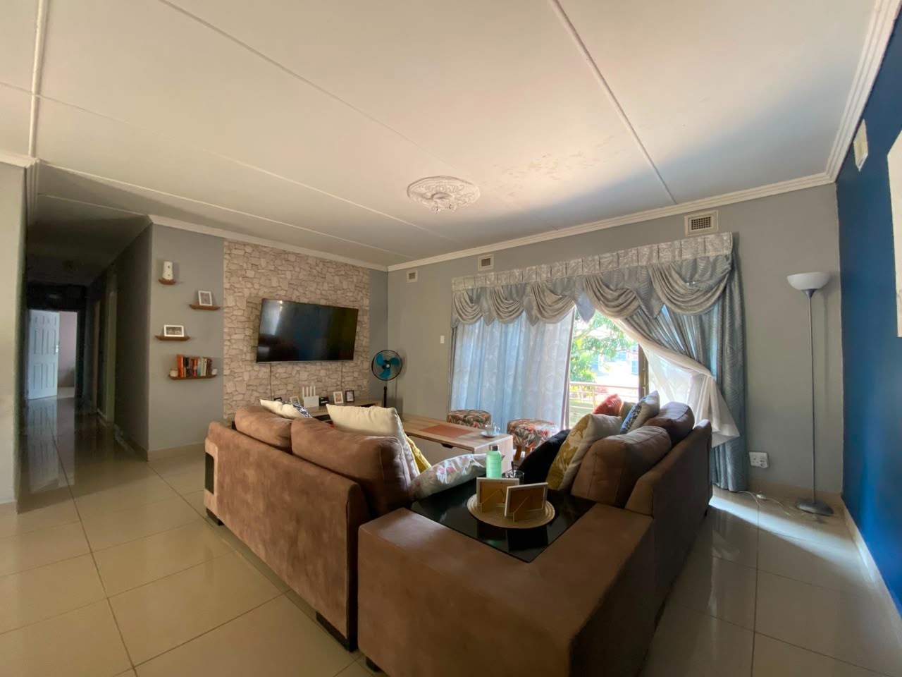 Spacious 3 Bedroom Family Home with Income-Generating Cottage for Sale in Bellair - Only R900,000
