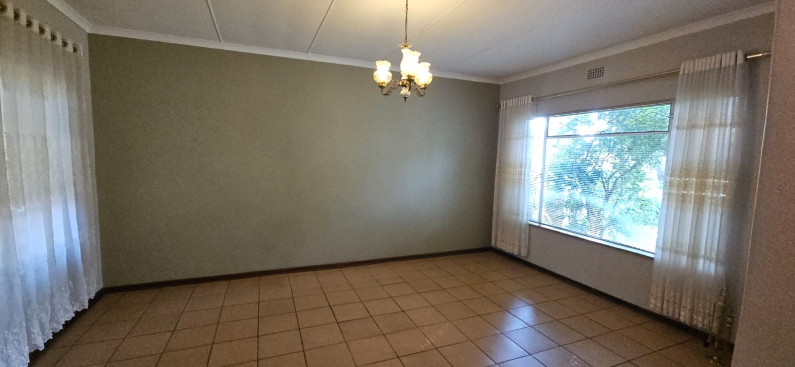 Neat family home in well sought after area. Tranquil garden with sprinkler system