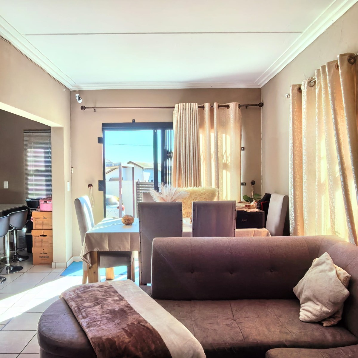 Home Sweet Home! 3 Bedrooms plus extra 2 bedrooms backroom.