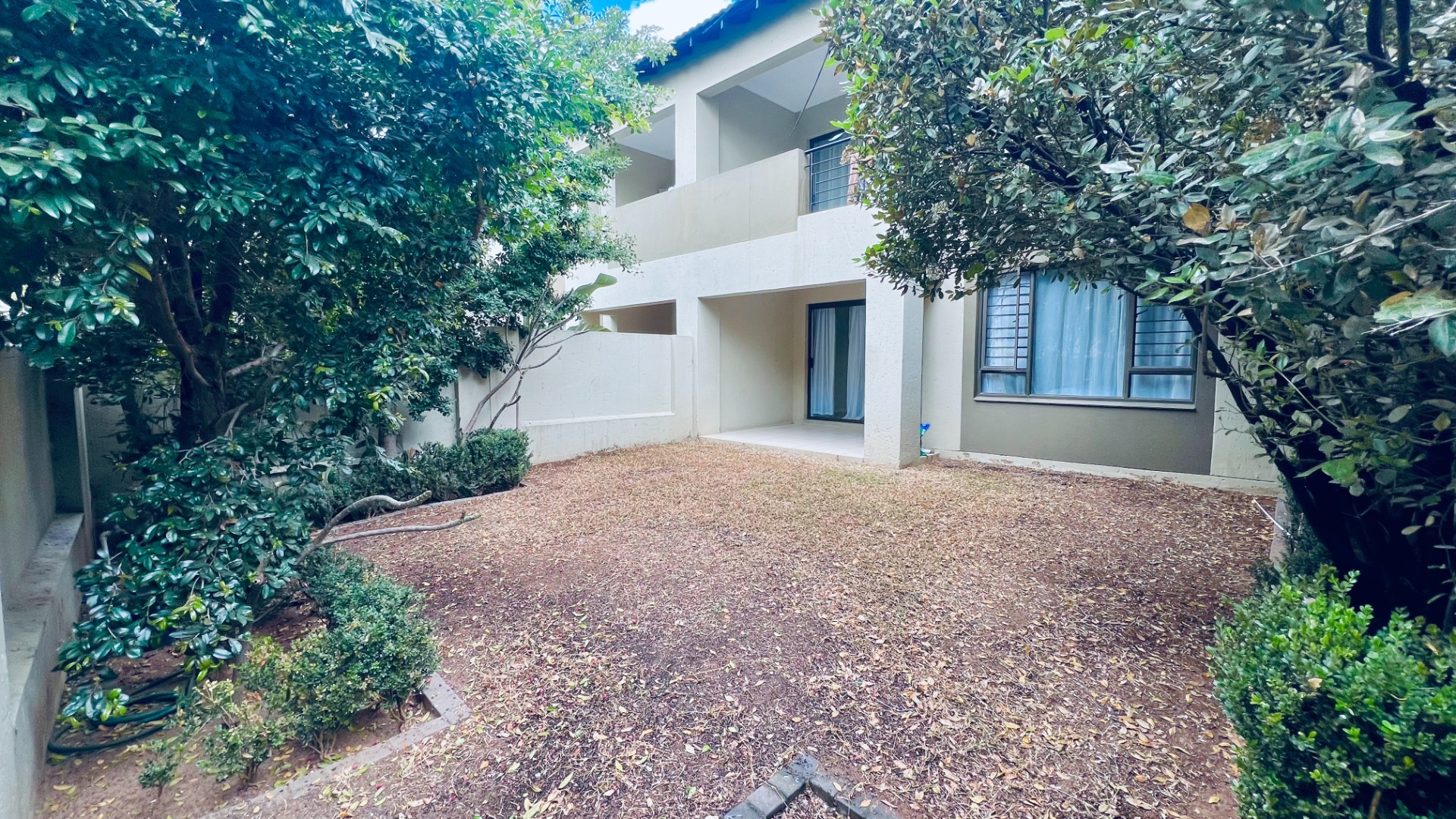 Two-Bedroom, Two-Bathroom Ground-Floor Apartment with Private Garden