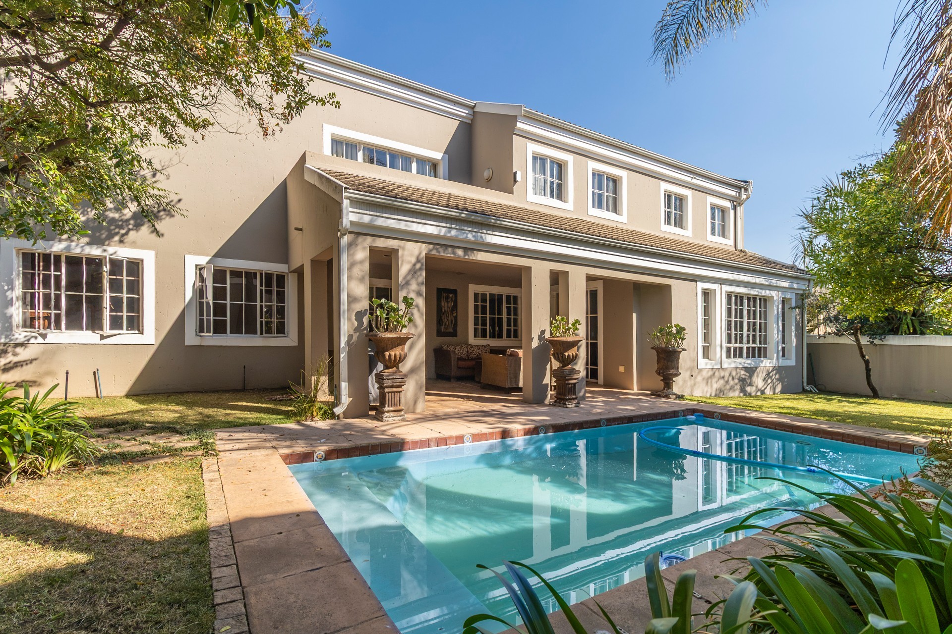 Immaculate 4 Bedroom Family Home with Pool, Backup Power And Water in Secure Woodmead Estate